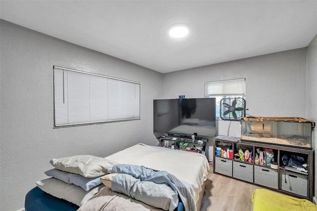 bedroom featuring light wood-type flooring