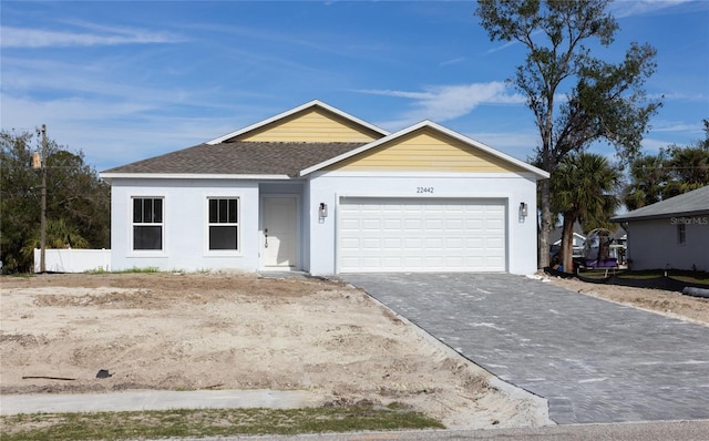 ranch-style home with a garage