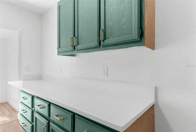 kitchen featuring green cabinetry