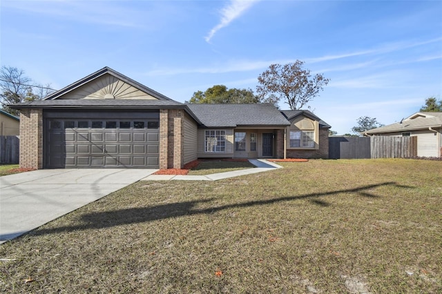 ranch-style house featuring a garage and a front yard