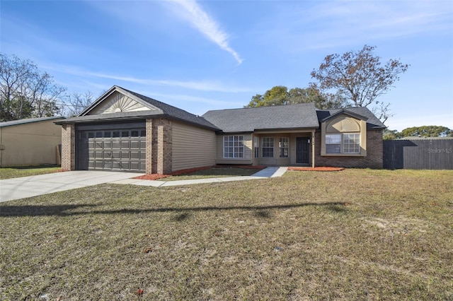 ranch-style home featuring a garage and a front yard