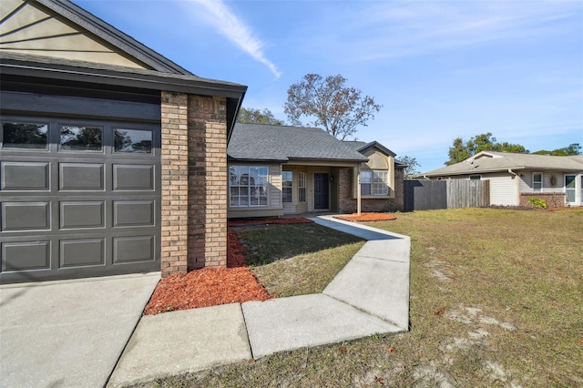 view of front of home with a front lawn