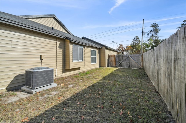 view of yard featuring central AC