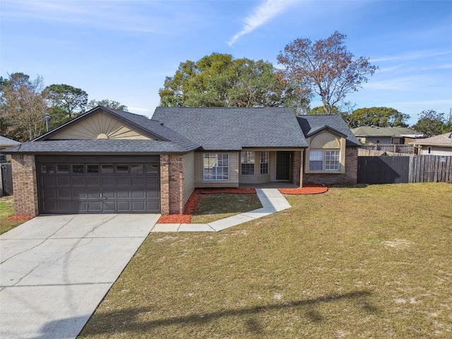 ranch-style house with a garage and a front yard