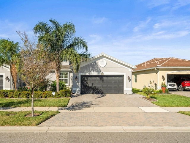 view of front of property with a garage