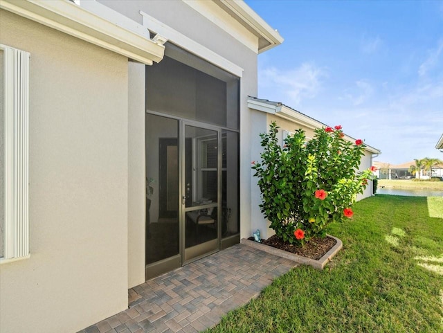 view of yard featuring a sunroom