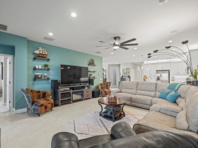 living room featuring ceiling fan