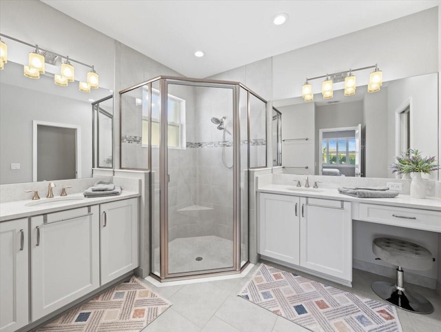 bathroom with vanity, tile patterned floors, and an enclosed shower