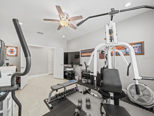 exercise room with ceiling fan