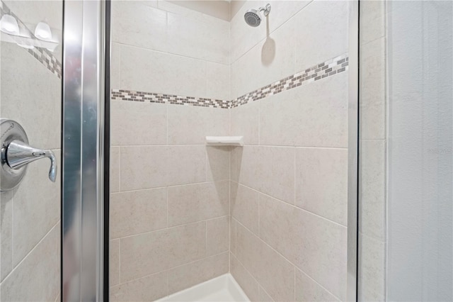 bathroom featuring an enclosed shower