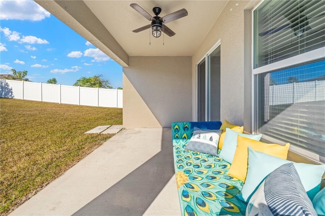 view of patio / terrace featuring an outdoor living space and ceiling fan