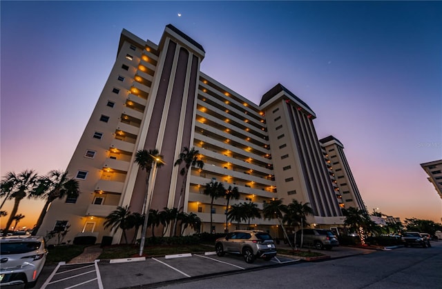 view of outdoor building at dusk