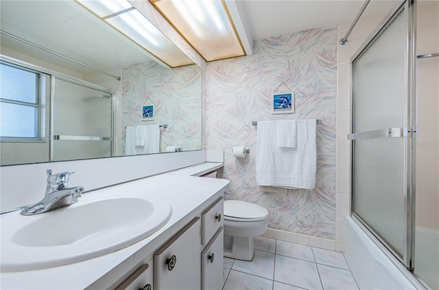 full bathroom with toilet, vanity, and combined bath / shower with glass door