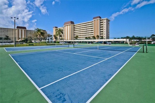 view of sport court featuring basketball hoop