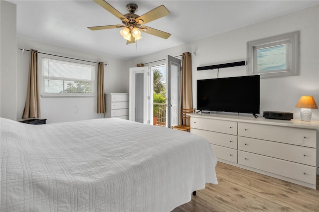 bedroom with access to exterior, light hardwood / wood-style flooring, and ceiling fan