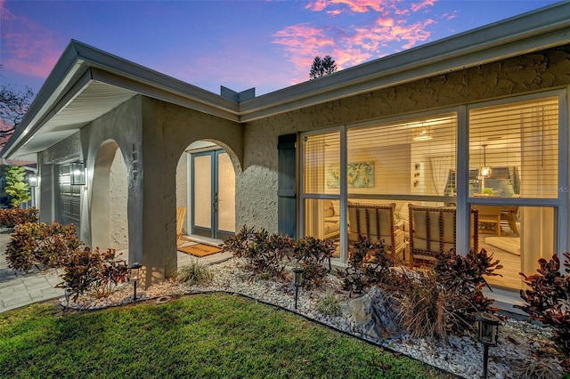 view of property exterior at dusk