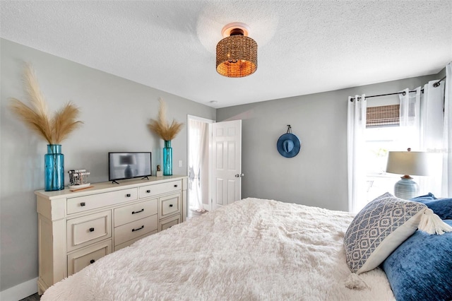 bedroom with a textured ceiling