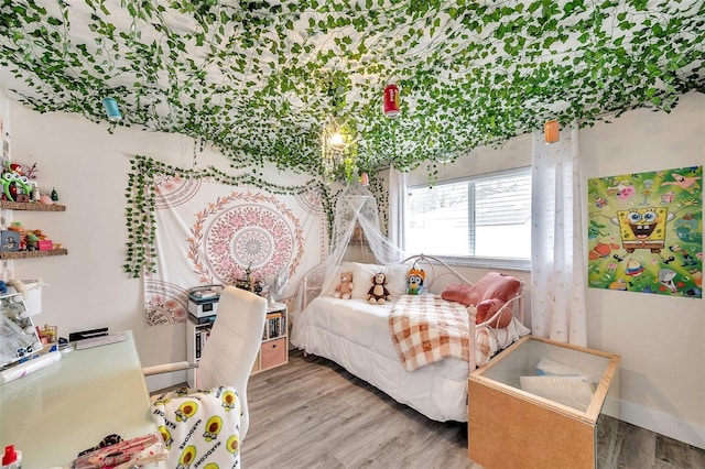 bedroom featuring light hardwood / wood-style floors