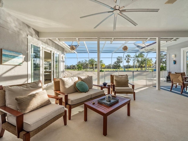 sunroom / solarium with ceiling fan and a healthy amount of sunlight