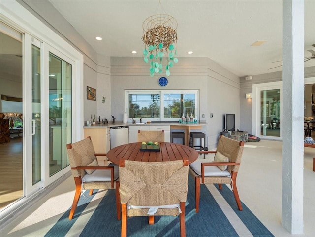 dining space featuring an inviting chandelier