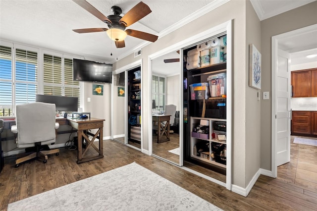 home office with a textured ceiling, ceiling fan, dark hardwood / wood-style floors, and ornamental molding