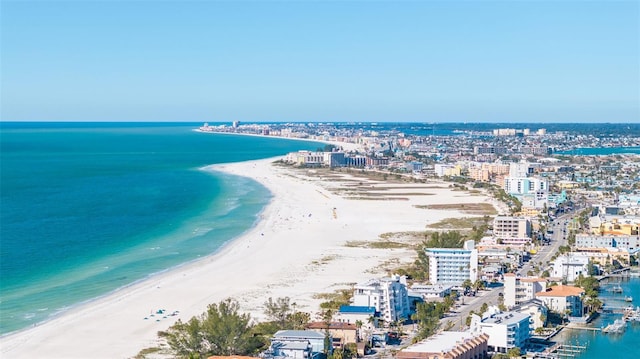 bird's eye view featuring a beach view and a water view