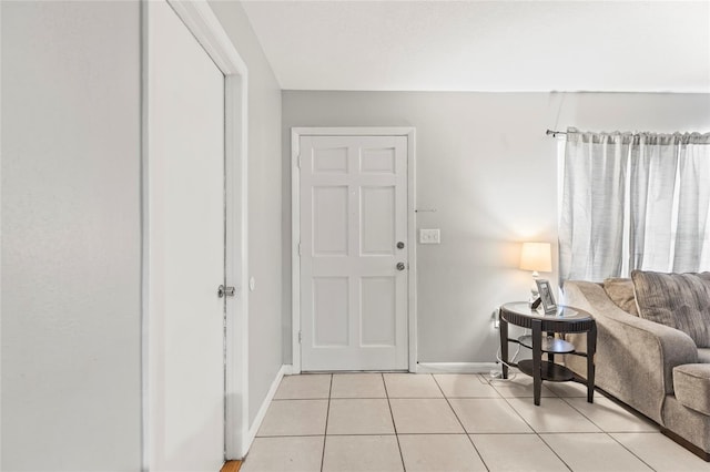 entrance foyer featuring light tile patterned floors