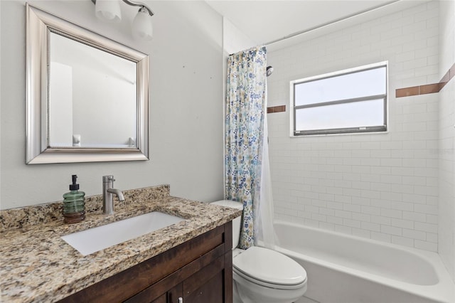 full bathroom with vanity, shower / bath combination with curtain, and toilet