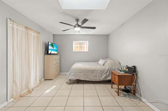 tiled bedroom with ceiling fan