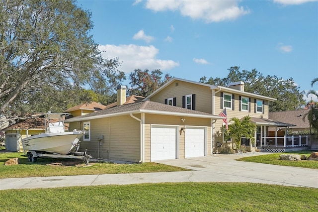 13945 75th Ave, Seminole, FL 33776 - view of front of home featuring a chimney, a front lawn, concrete driveway, and an attached garage