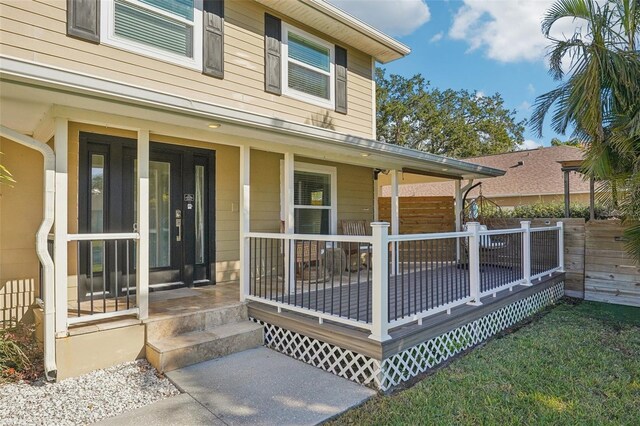 13945 75th Ave, Seminole, FL 33776 - doorway to property featuring fence