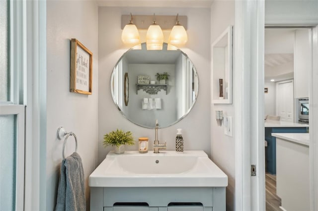 13945 75th Ave, Seminole, FL 33776 - bathroom with vanity and wood finished floors