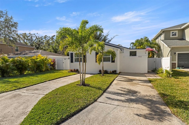 view of front of home with a front lawn