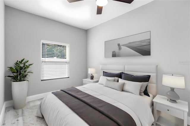 bedroom featuring ceiling fan and light wood-type flooring