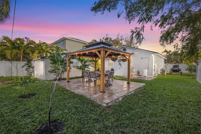 exterior space with a gazebo and central AC unit