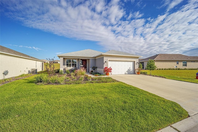 ranch-style home featuring cooling unit, a front yard, and a garage