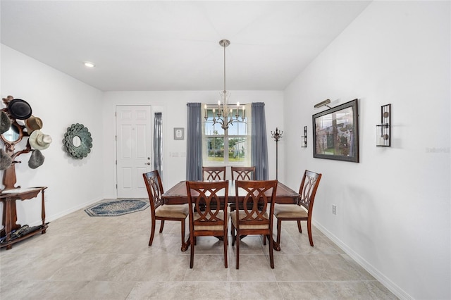 dining space with a notable chandelier