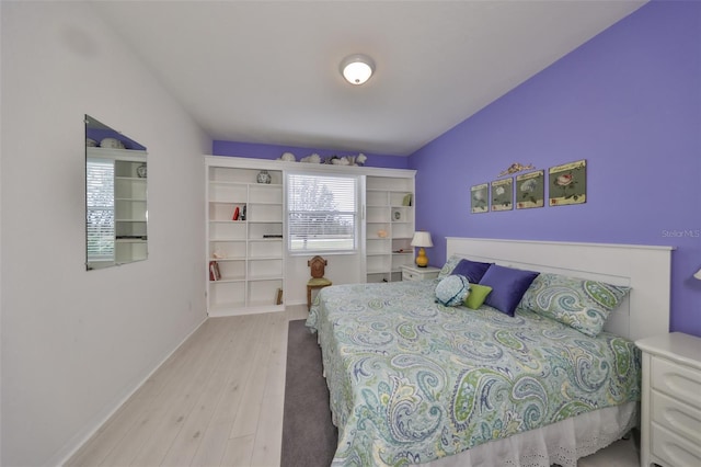 bedroom featuring light wood-type flooring