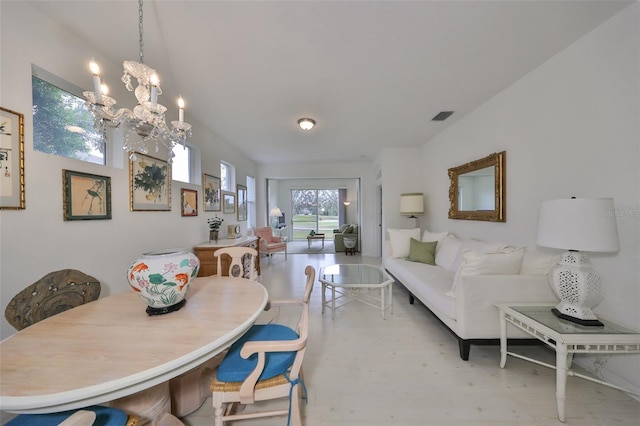 dining area featuring a chandelier