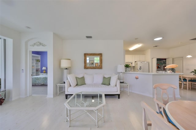 living room featuring light hardwood / wood-style floors