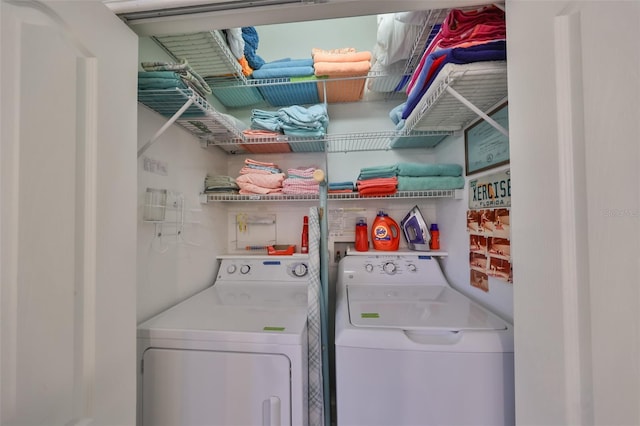 washroom with washing machine and dryer