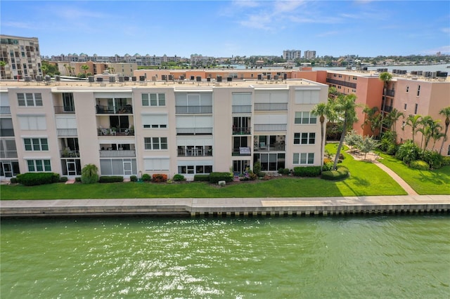 view of building exterior with a water view