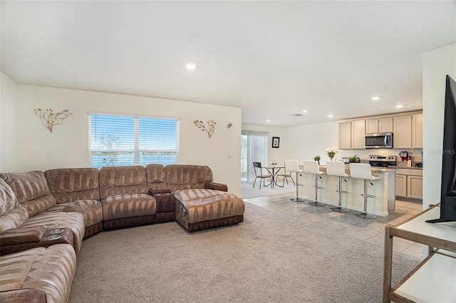 living room with light colored carpet