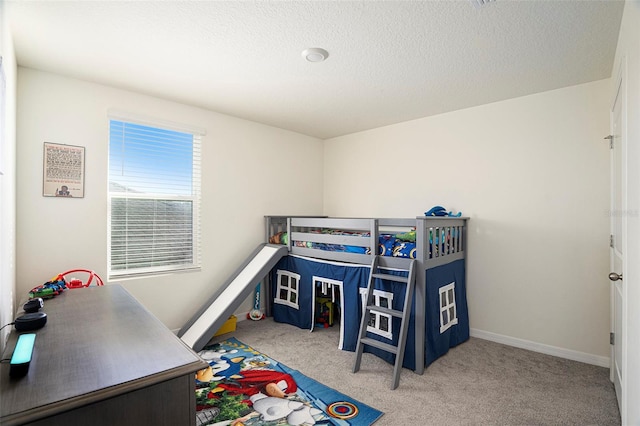 bedroom with light colored carpet