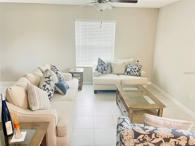 tiled living room featuring ceiling fan