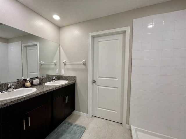 bathroom featuring vanity and tile patterned flooring