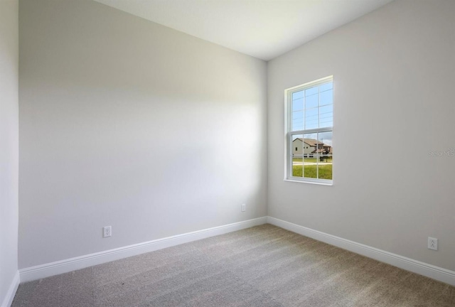 unfurnished room featuring carpet floors