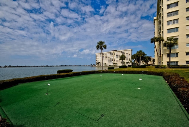 surrounding community featuring a water view