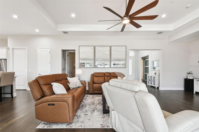 5226 Lake Venice Dr, Wimauma, FL 33598 - living area with dark wood-style floors, visible vents, and a raised ceiling