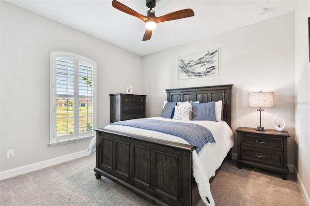5226 Lake Venice Dr, Wimauma, FL 33598 - carpeted bedroom with a ceiling fan and baseboards